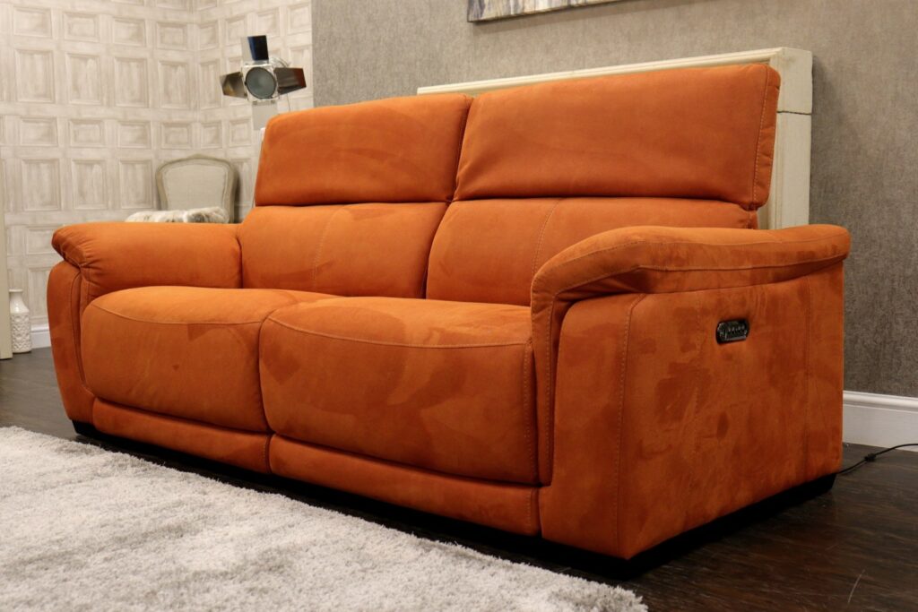 ORLEANS (Famous Designer Brand) Premium ‘Burnt Orange – Lifestyle Textured’ Eazi-Clean Fabrics Collection – Dual Power/HR Reclining 3 Seat Sofa