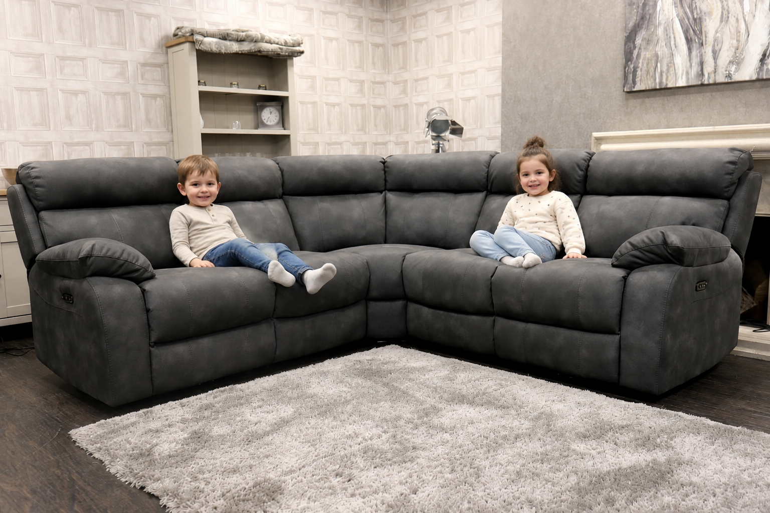 Kids playing near a sturdy leather sofa